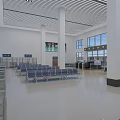 Modern Station Waiting Hall With Blue Seats Large Windows And Display Screen