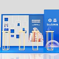 Check-in Photo Spot at Huaqiao University Journalism School with Blue Display Stands and Building Model