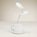 Fresh Coffee Beans Pouring Into White Ceramic Cup For Morning Brew