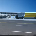 Modern Office Building Exterior With Glass Facade And Sleek Contemporary Design
