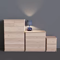 Modern White Chest of Drawers with Multiple Drawers and Blue Table Lamp