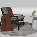 Lounge Chair With Wooden Frame Light Gray Cushion Brown Blanket On Round Woven Rug
