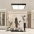 Modern Clothing Store Interior With White And Black Decor Clothing Racks Mannequins Mirrors And Plants