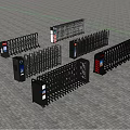 Multiple Retractable Security Gates With Access Control Devices On Paved Surface