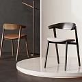 Modern Accent Chairs In Wood And Dark Finish With Light Cushion On White Circular Platform