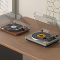 Two Turntables With Clear Dust Covers On Wooden Desk Near Window Blinds And Geometric Wall