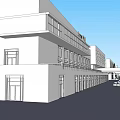 Modern Commercial Street With Contemporary Buildings Shop Fronts And Pedestrian Walkway