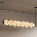 Elegant Wavy Cream Fabric Chandelier Suspended From Ceiling With Black Rods