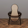 Modern Dining Chair With Woven Design And Dark Frame On Herringbone Wooden Floor