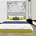 Double Bed with Green Headboard White Blue Sheets Yellow Blue Pillows and Decorative Wall Art 3d model