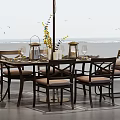 Outdoor Table with Umbrella and Chairs Featuring Sea View and Decorative Centerpiece