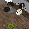 Modern Chandelier with Black and White Circular Pendants Hanging Above Wooden Kitchen Counter