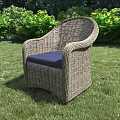 Stylish Rattan Leisure Chair With Blue Cushion Comfortable Outdoor Seating Design