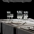 Elegant Dinnerware Set with White Plates Napkins Cutlery and Glass Goblets for Formal Table Setting