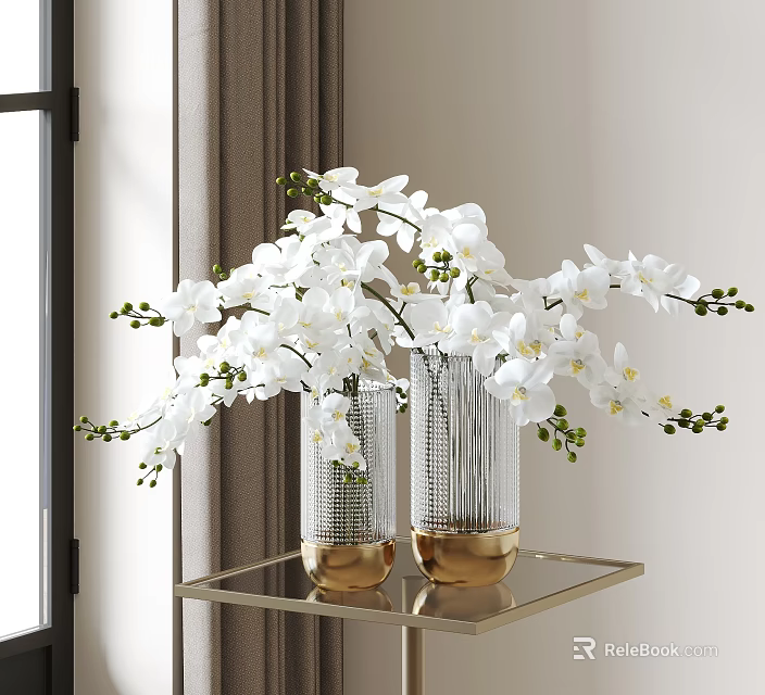 White Orchid Flowers In Transparent Striped Vases With Gold Base On Gold Metal Shelf 3d model 