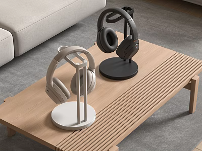 Modern Headphones With Light Gray And Black Headphone Stands On Wooden Coffee Table 3d model