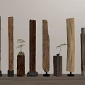 Decorative Wooden Pillars With Various Bases And Small Plants In Interior