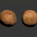 Two Fresh Orange Sweet Potatoes With Smooth Skin On Black Reflective Background