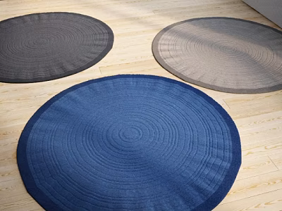 Woven Round Rugs in Dark Gray Light Gray and Blue on Wooden Floor 3d model