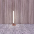 Slim Floor Lamp With Round Base In Minimalist Room With Wooden Wall And Floor
