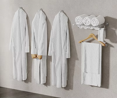 White Bath Robes Hanging in Bathroom with Rolled Towels and Wooden Hanger 3d model
