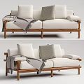 Elegant Two Seater Sofa Living Room Interior With Wooden Frame Light Cushions And Gray Blanket