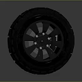 Rugged Off Road Tire With Black Wheel Rim Multiple Holes And Deep Tread Pattern