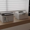 Modern Office Appliances Two Printers On Wooden Desk With Window Blinds In Background