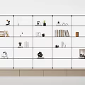 Modern Glass Compartment Bookcase With Books Decorative Items And Small Plants