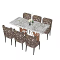 Dining Table And Chairs Set With Marble Tabletop Patterned Upholstered Chairs Vase And Plant Decoration