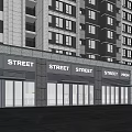 Modern Commercial Street With High Street Signs And Glass Shop Fronts