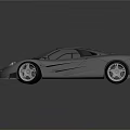 High Performance Gray Sports Car with Sleek Design Striking Front and Polished Alloy Wheels