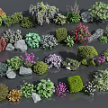 Various Colorful Flowers and Green Plants with Decorative Stones in Natural Arrangement