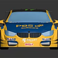 Yellow And Blue Racing Car With PBSS MOTUL Logos Number 17 And Rear Wing