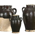 Various Sizes Two Handled Vintage Ceramic Jars With Dark Brown And Cream Textured Surfaces