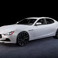 White Maserati Sedan With Sleek Body Design Black Alloy Wheels And LED Headlights
