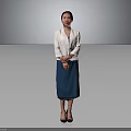 Woman in White Blazer and Blue Skirt Standing with Hands Crossed on Gray Background