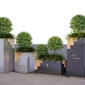 Modern Garden Decorative Planters With Green Topiaries And Tiered Design