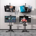 Multiple Televisions On Stands Displaying Various Content And Screens