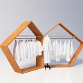 Modern Wooden Hexagonal Display Rack Holding White Clothes With Central Black Stand