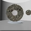Circular Stone Art Installation On White Base With Hanging Sphere 3d model