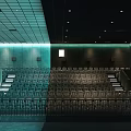 Spacious Modern Cinema Interior Featuring Neatly Arranged Seats And Ambient Lighting