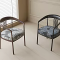 Dining Chairs With Brown And Black Frames And Patterned Seat Cushions By Window