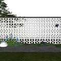 Perforated Decorative Wall with Butterfly Decorations and Flower Plants on Green Lawn Under Blue Sky