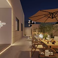 Serene Courtyard Garden Featuring Outdoor Dining Table Chairs Large Umbrella Stone Walls And Evening Lighting