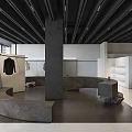 Minimalist Modern Clothing Store Interior With Gray Counter And Hanging Clothes