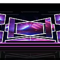 Commercial Equipment Stage Setup With Multiple Displays And Purple Blue Lighting