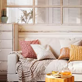 Cozy Two Seater Sofa With Colorful Cushions Throw Blanket Wooden Side Table And Woven Pendant Light
