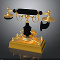 Vintage Gold and Black Telephone with Classic Dial Design and Brass Base