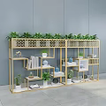 Golden Multi Tiered Lattice Flower Stand With Green Plants And Decorative Items